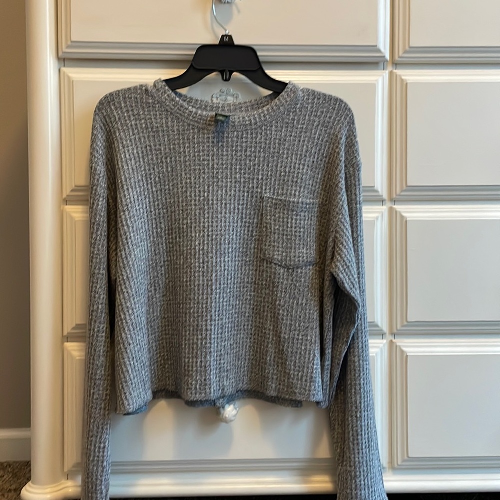 Woman’s Soft And Comfortable Cropped Sweater
